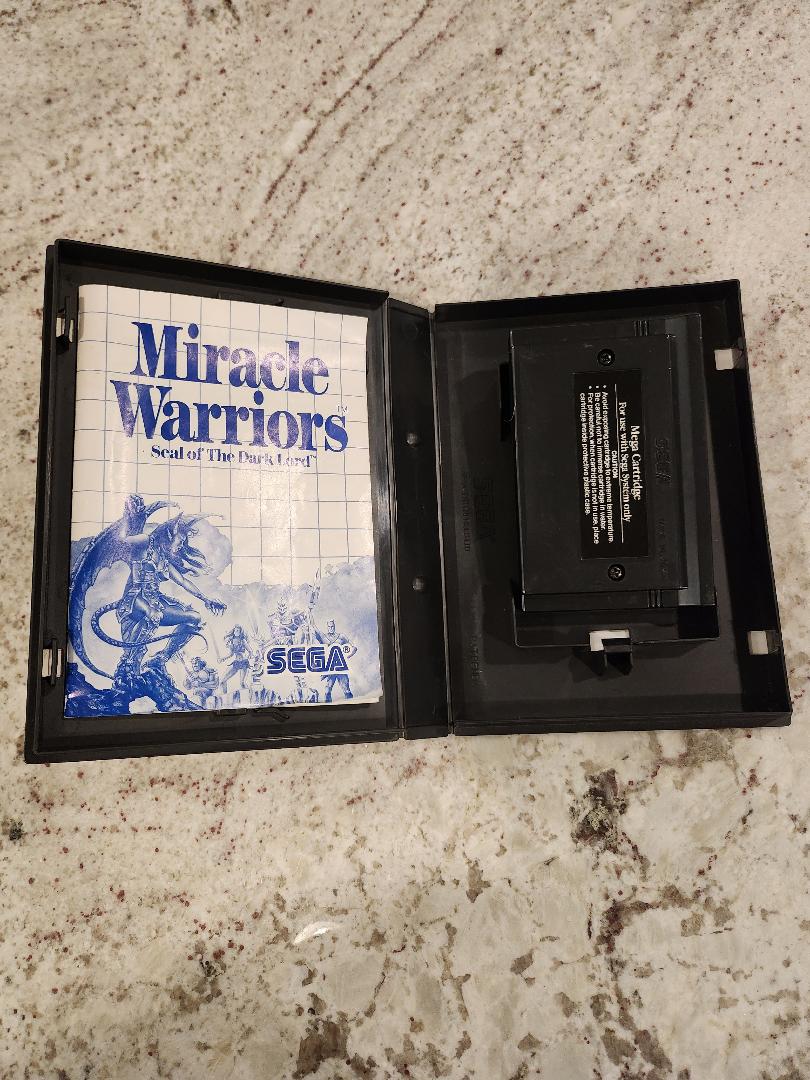 Carro maestro de Sega de Miracle Warriors. Manual y caja 